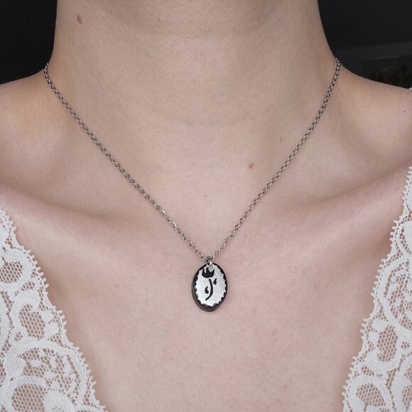 Dainty iridescent flower necklace with a small silver chain - Picture 1 of 8